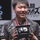 Shuto “Shuton” Moriya after being presented with a controller for winning first-place at Evo Japan’s Smash Bros. Ultimate tournament.